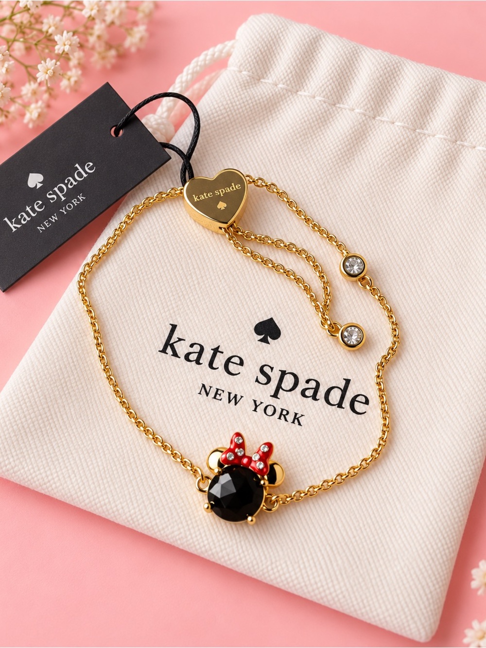 kate spade gold-tone necklace with black stone and red bow charm